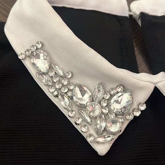 Black dress with white collar that has crystals. - Picture 3 of 6